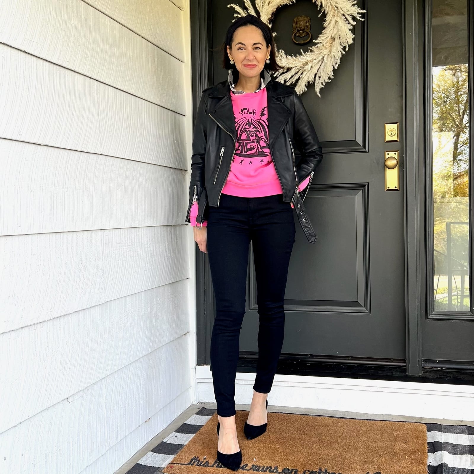 Pink Graphic Sweatshirt Under Leather Moto Jacket — Trendy Sweatshirt Outfits Women