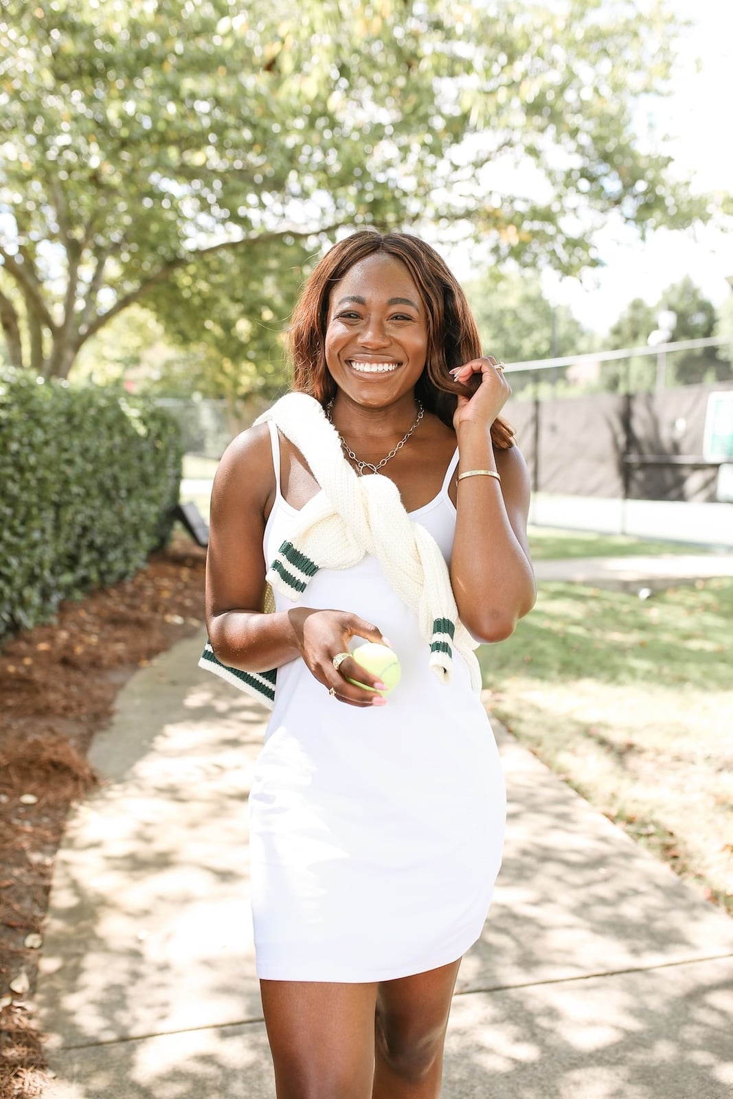 Classic White Tennis Dress with Sweater Accent Classic White Tennis Dress with Sweater Accent — Trendy Tennis Outfits