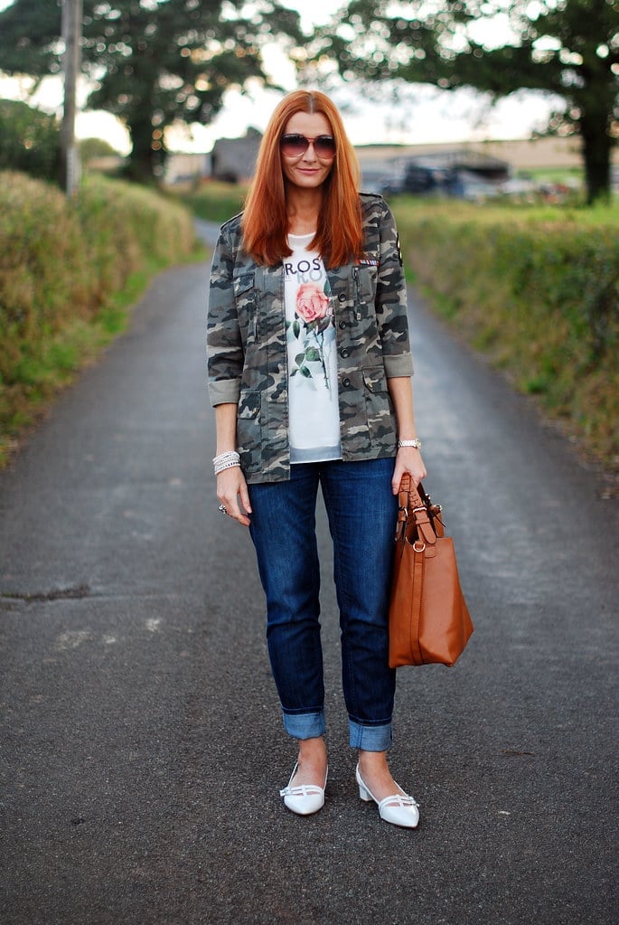 Camouflage Jacket with Floral Graphic Tee and Cuffed Jeans Camouflage Jacket with Floral Graphic Tee and Cuffed Jeans — Trendy Tomboy Outfits