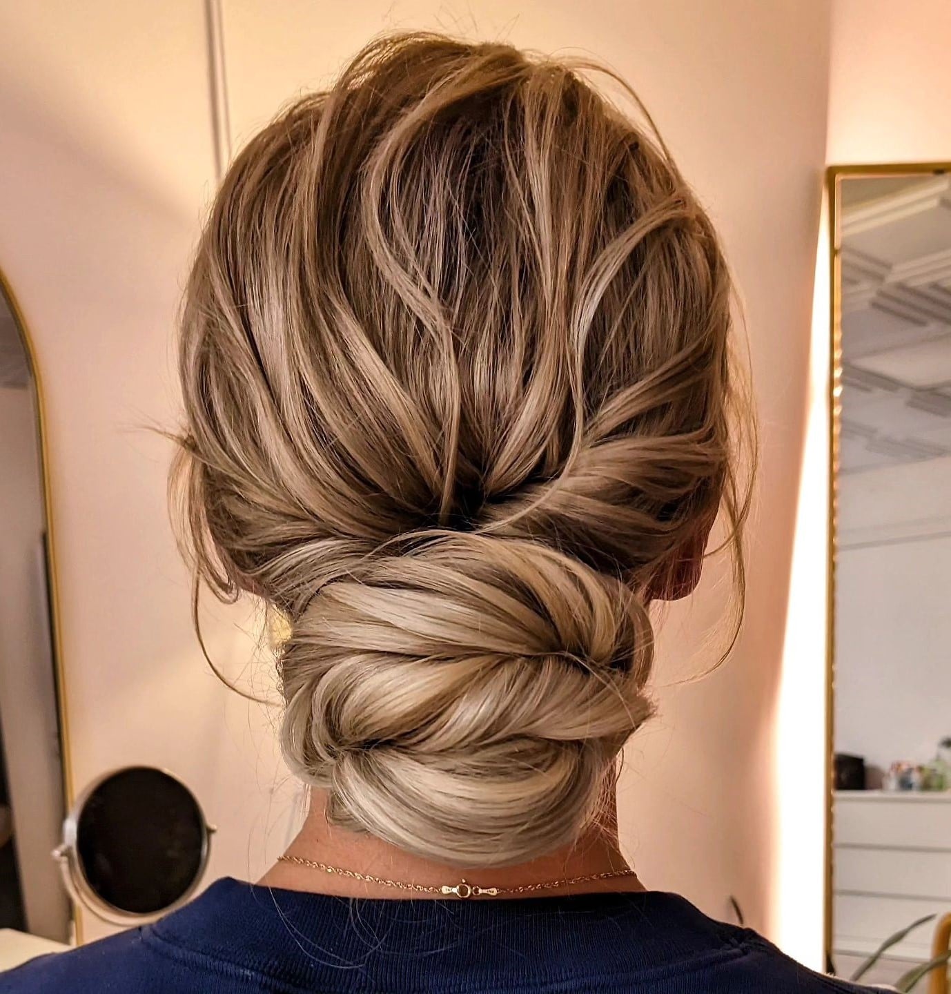 Textured Blonde Low Bun — Trendy Wedding Guest Updos