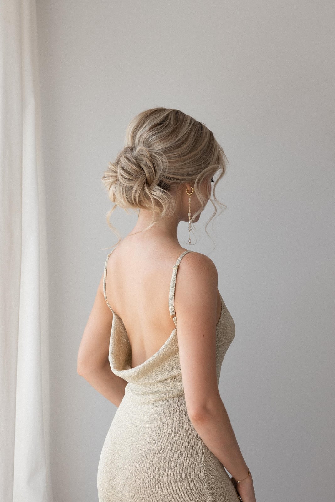 Ash Blonde Low Updo With Twists — Trendy Wedding Guest Updos