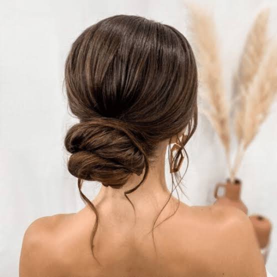 Dark Brown Smooth Low Bun, Mid-Back — Trendy Wedding Guest Updos