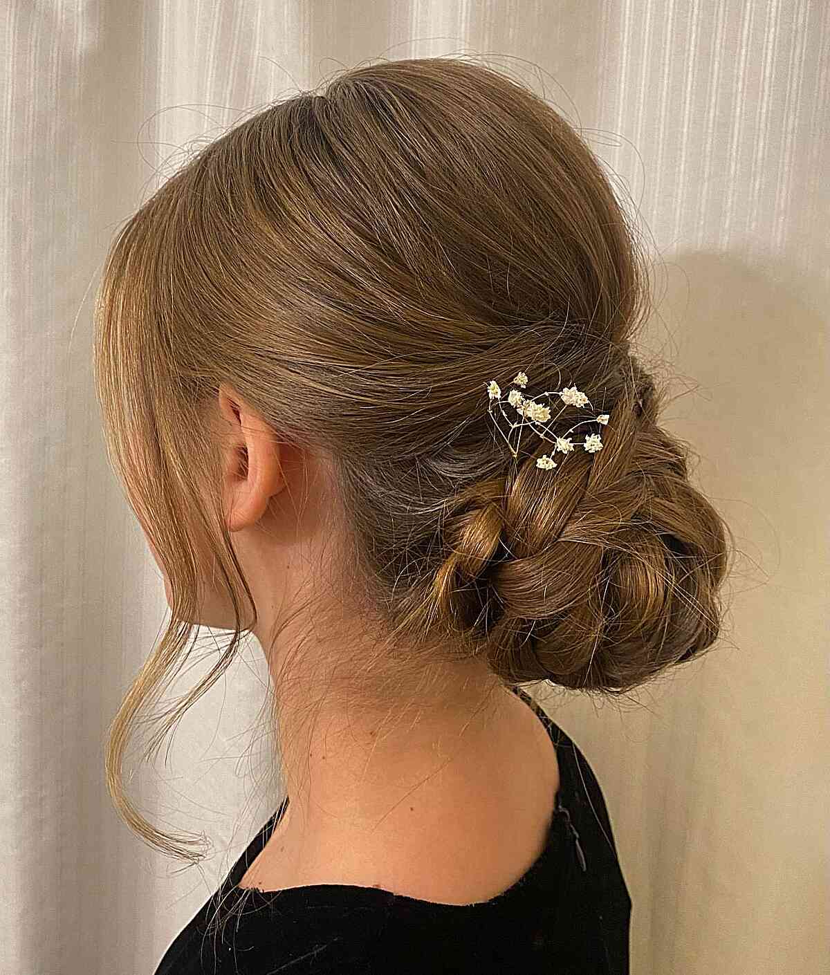 Blonde Low Bun With Darker Roots, Close-Up Take — Trendy Wedding Guest Updos