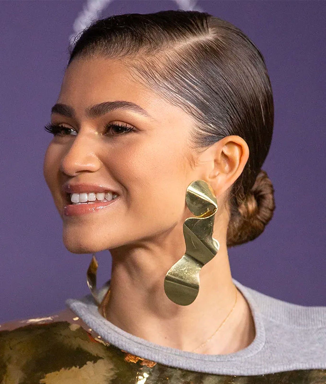 Dark Brown Sleek Low Bun — Trendy Wedding Guest Updos