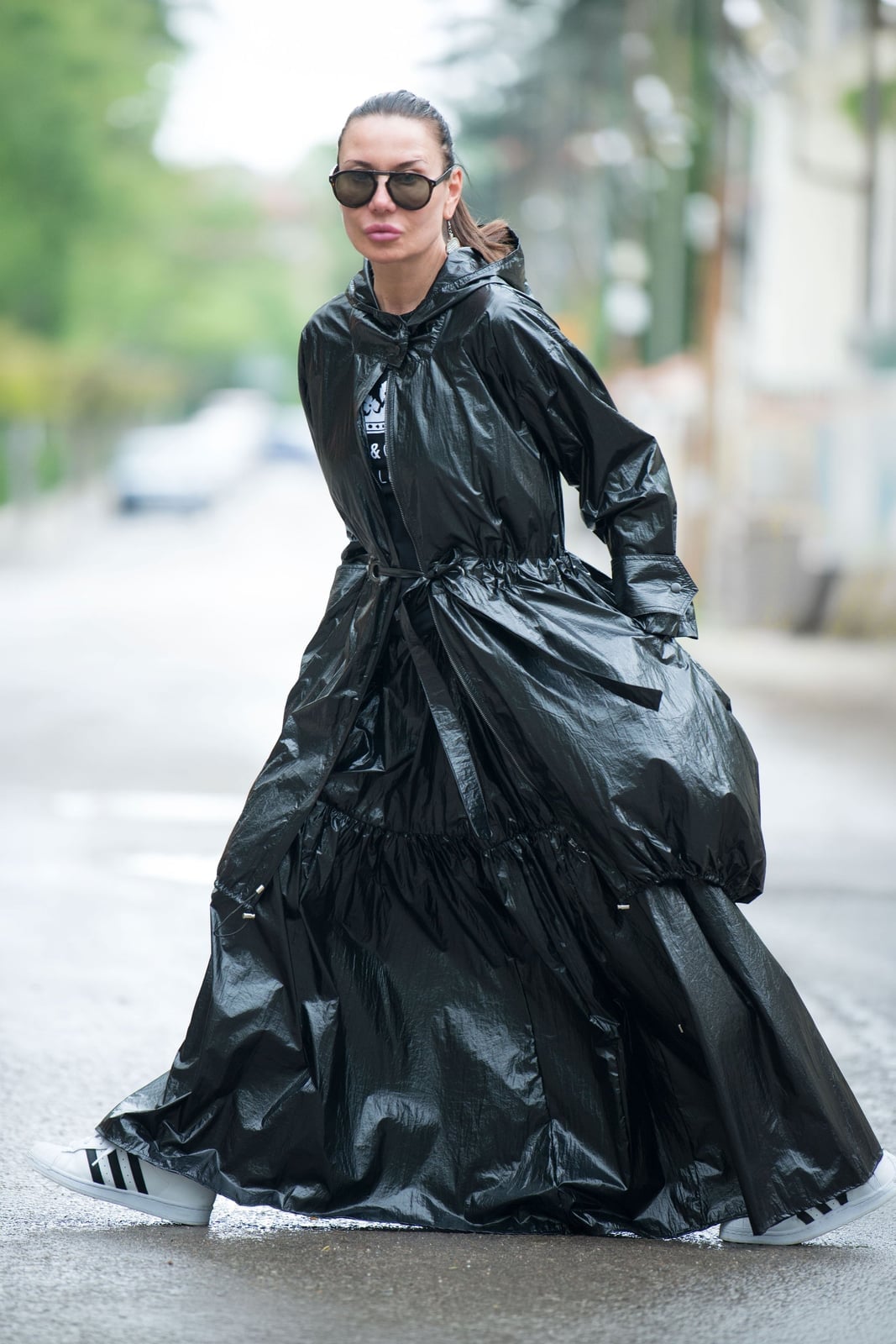 Long Black Hooded Windbreaker Dress with Voluminous, Close-Up Take — Trendy Windbreaker Outfits