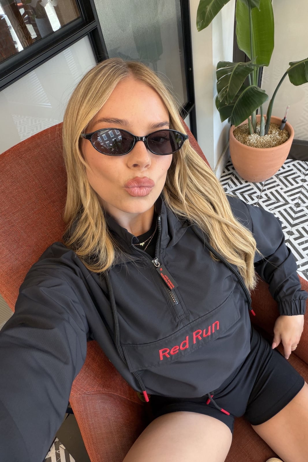 Black Cropped Windbreaker with Red Zipper Details — Trendy Windbreaker Outfits