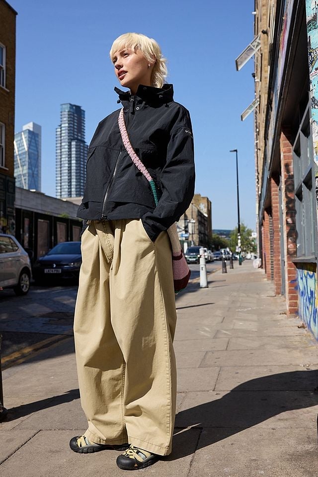 Black Hooded Windbreaker with Extremely Wide Leg Pants — Trendy Windbreaker Outfits