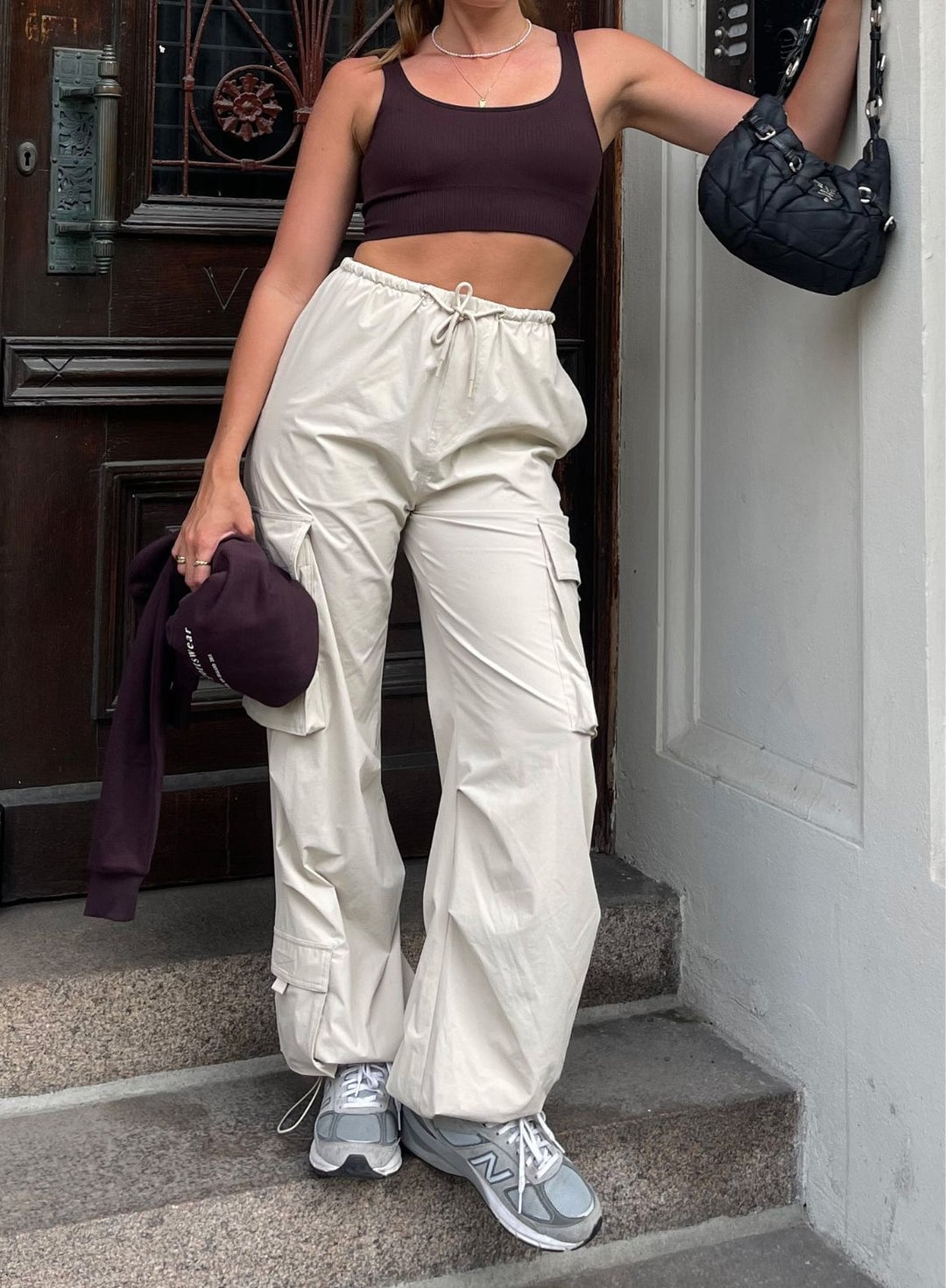 Burgundy Cropped Hoodie with Beige Cargo Pants — Trendy Windbreaker Outfits