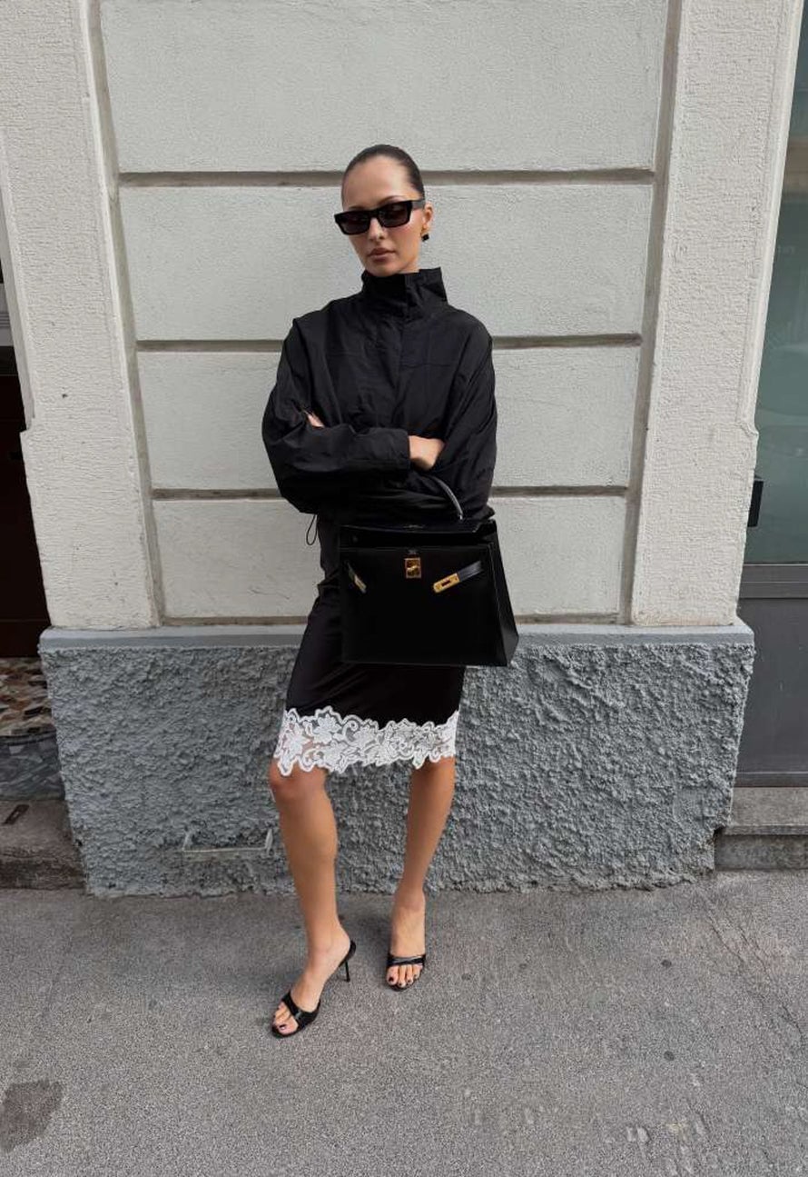 Oversized Black Windbreaker Over a Lace Trim Dress — Trendy Windbreaker Outfits