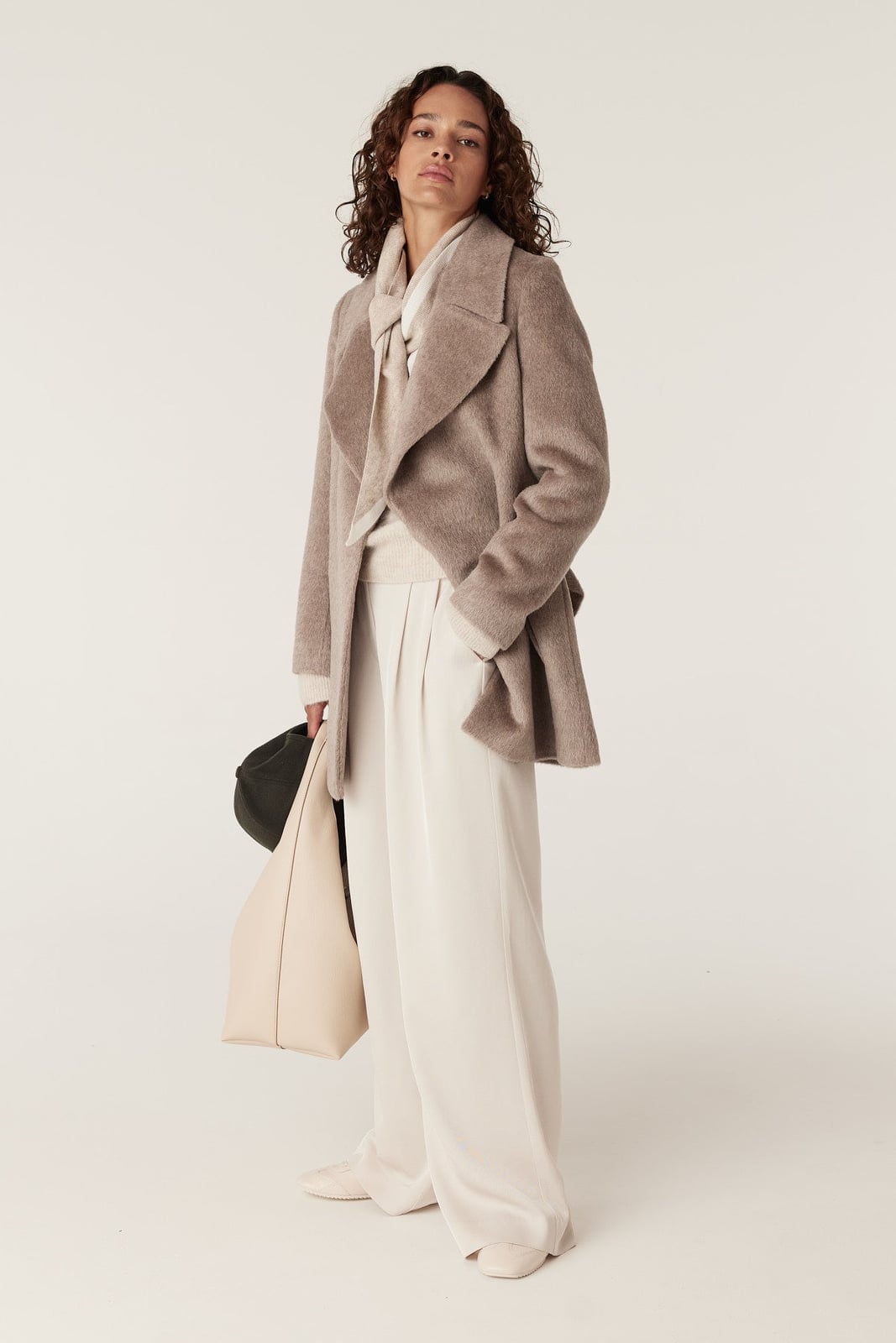Relaxed Taupe Wool Coat With Cream Knitwear and White Sneakers — Trendy Wool Coat Outfits