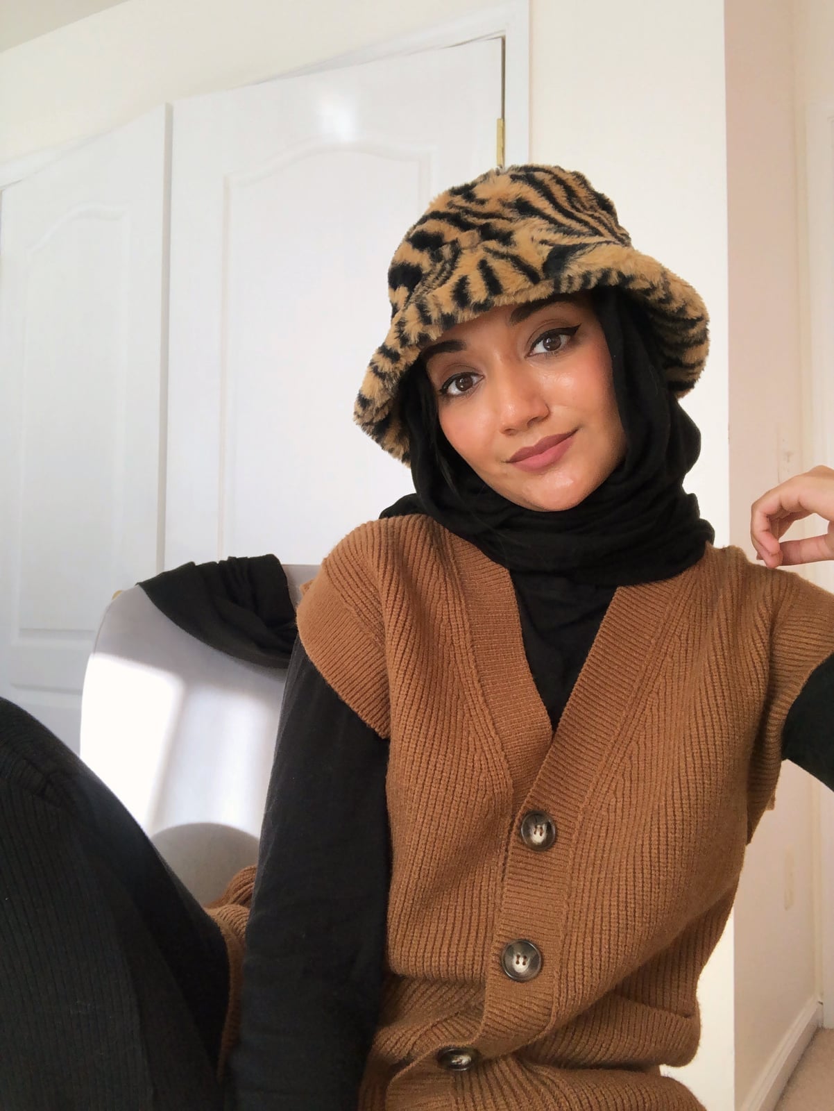 Knit Vest with Animal Print Bucket Hat Knit Vest with Animal Print Bucket Hat — Trendy Work From Home Outfits