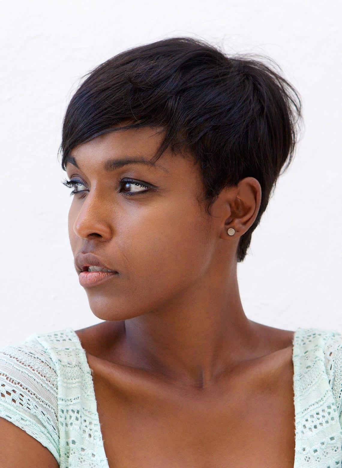 Textured Black Pixie With Side-Swept Bangs Textured Black Pixie With Side-Swept Bangs — Trendy Work Hair