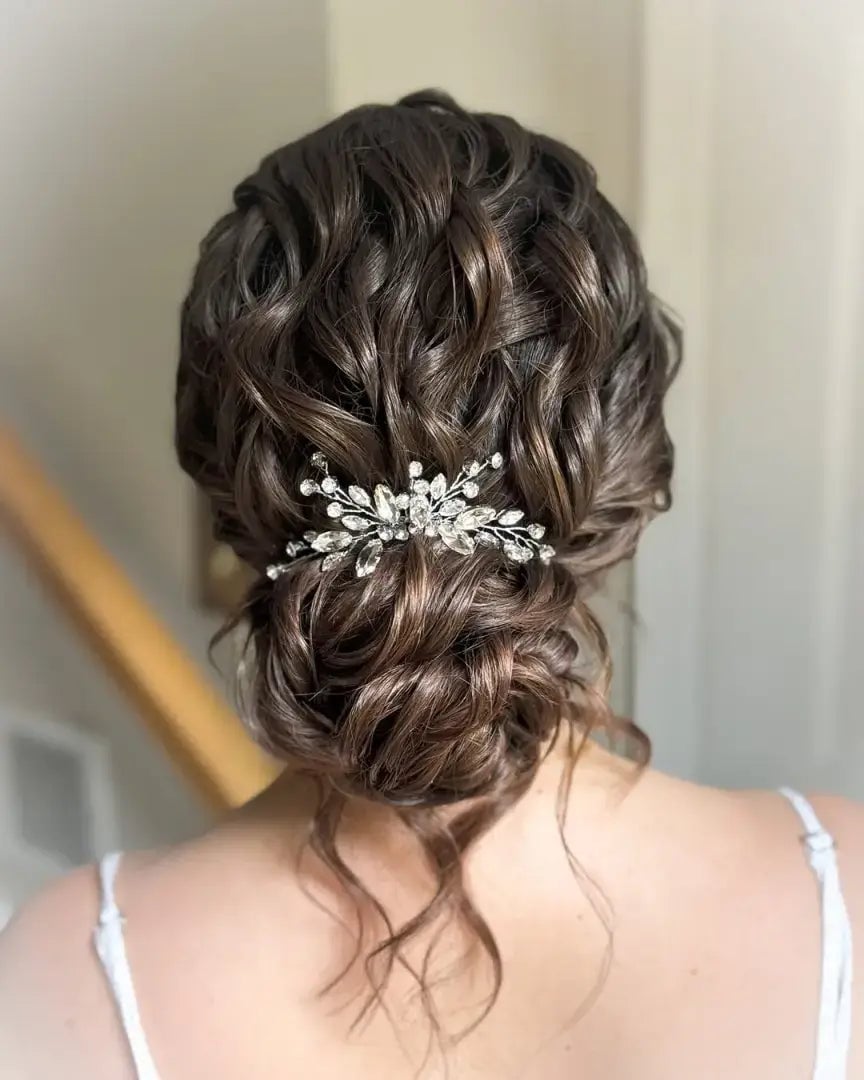 Textured Dark Brown Bun With Sparkling Accessory Textured Dark Brown Bun With Sparkling Accessory — Wedding Bun Ideas
