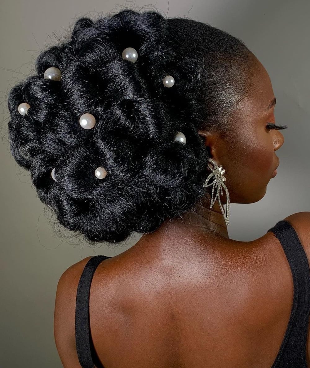 Elaborate Coily Black Updo With Pearls Elaborate Coily Black Updo With Pearls — Wedding Bun Ideas