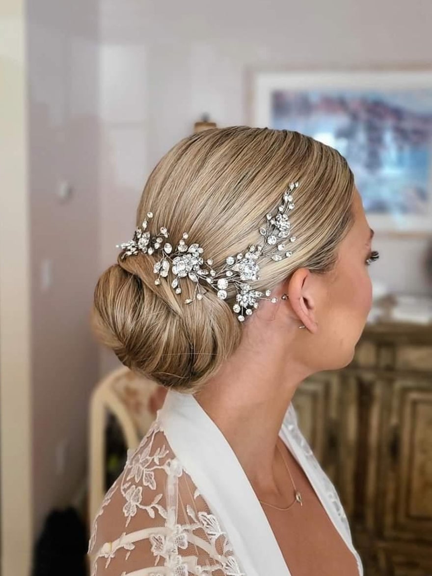 Sleek Blonde Low Updo With Headpiece Sleek Blonde Low Updo With Headpiece — Wedding Bun Ideas