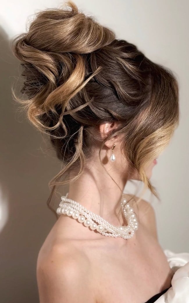 Voluminous Dark Blonde Textured Bun Voluminous Dark Blonde Textured Bun — Wedding Bun Ideas