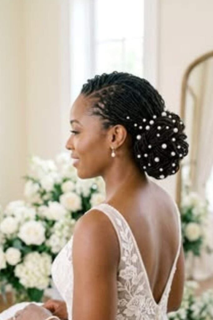Loc Bun With Pearl Embellishments Loc Bun With Pearl Embellishments — Wedding Bun Ideas