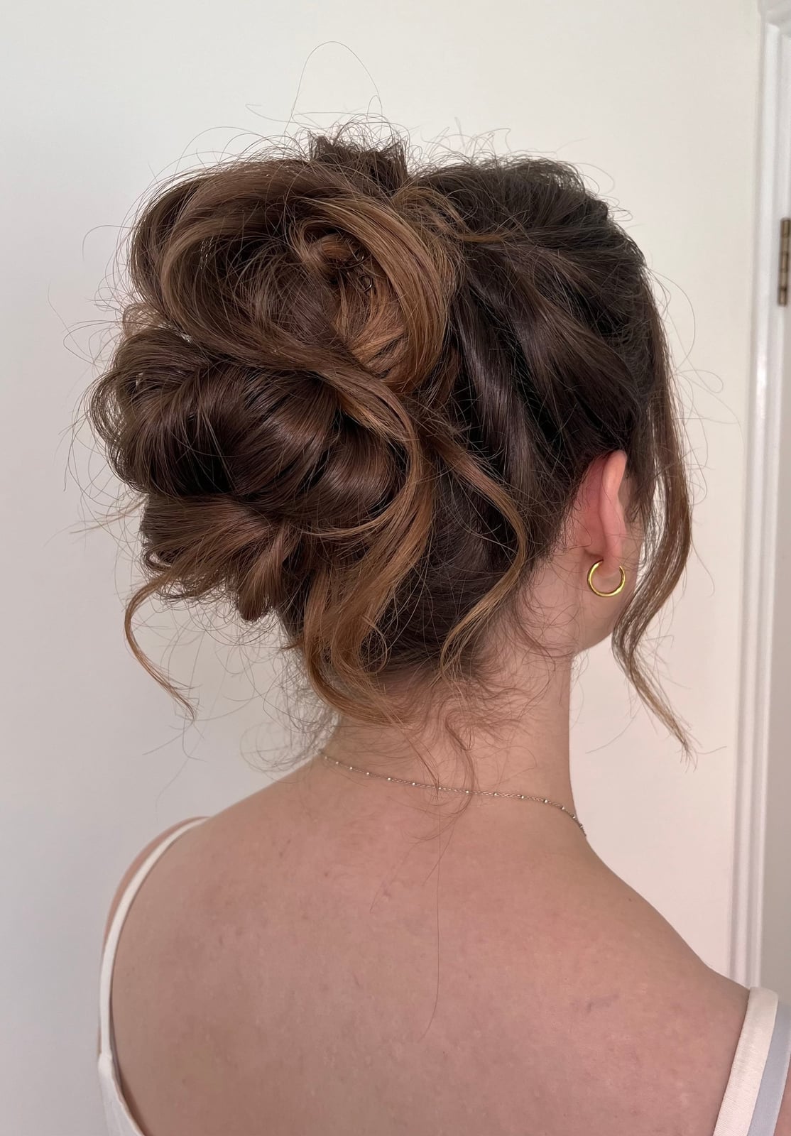 Voluminous Messy Dark Brown Bun, Wavy Voluminous Messy Dark Brown Bun, Wavy — Wedding Bun Ideas