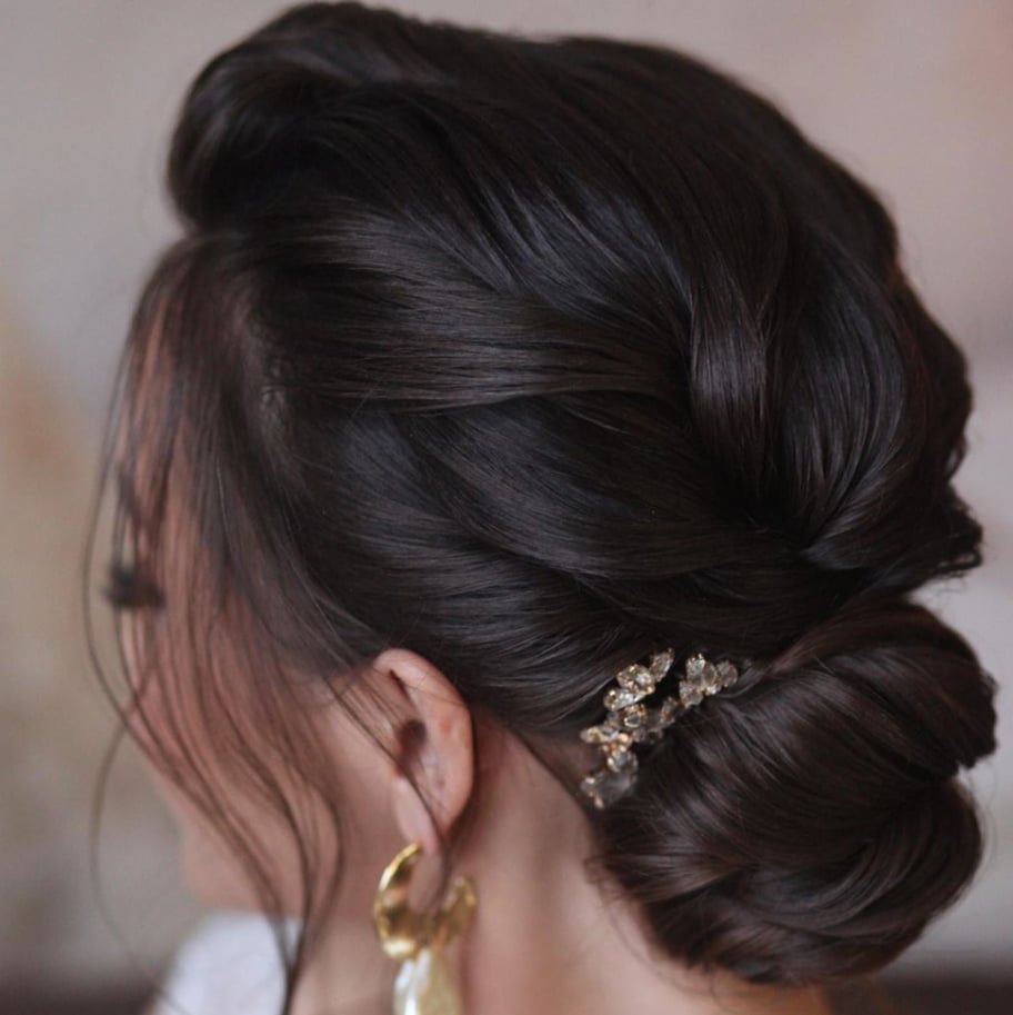 Blonde Updo With Ornate Floral Arrangement Blonde Updo With Ornate Floral Arrangement — Wedding Bun Ideas