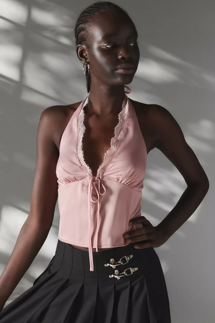 Pink Satin Halter Top with Black Pleated Skirt — Y2K Party Outfit Inspiration