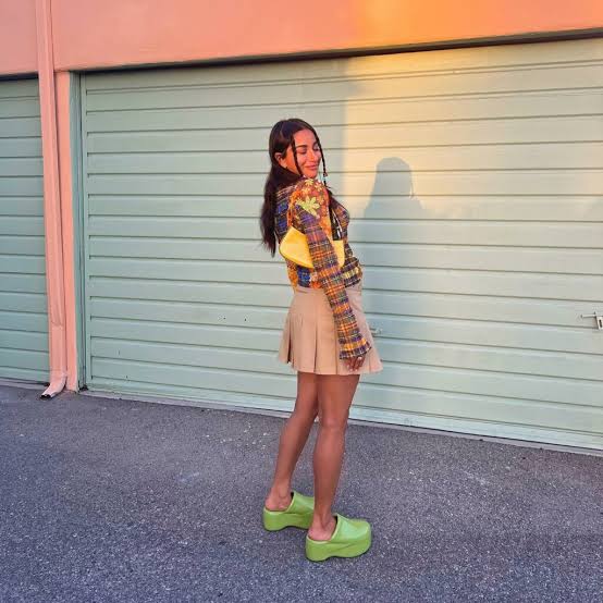 Plaid Shirt and Tan A-Line Mini Skirt Combination — Y2K Party Outfit Inspiration